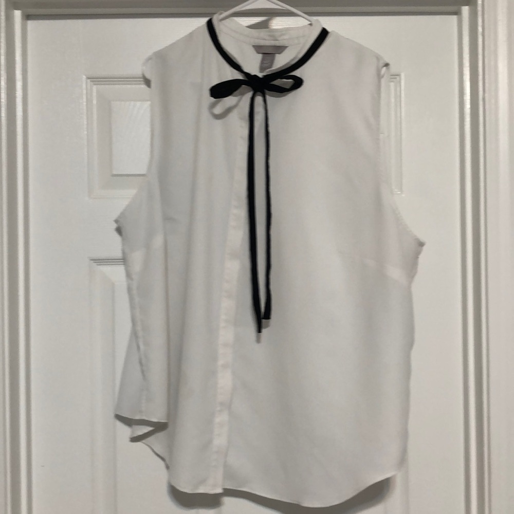 White and black sleeveless bow shirt